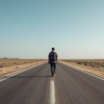 Lucid_Origin_professional_photo_of_A_person_walking_alone_on_a_2-1024x573